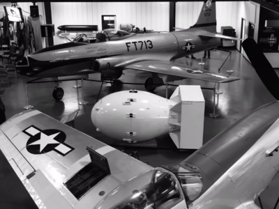 The first of three images that I made of the all-white Fat Man at the Air Force Armaments Museum at Elgin Air Force Base, in Florida's Panandle. One hundred and twenty Fat Man bombs were produced (as the Mark III bomb) in the years following World War II. This is an actual ballistic case of one of those bombs.