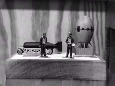 Also at the Grissom Air Museum, this small wooden model display of Little Boy, Fat Man, and two crew members. Again, the model Fat Man sits upon its stabilizer.