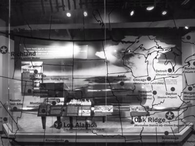 An image from the new galleries at the K-25 History Center at Oak Ridge, Tennessee, the site where uranium was purified for use in Little Man and for further processing into plutonium in Washington state. The display emphasizes the many other locations (in addition to the famous Los Alamos) that worked on developing the bomb.