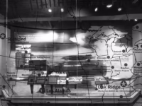 An image from the new galleries at the K-25 History Center at Oak Ridge, Tennessee, the site where uranium was purified for use in Little Man and for further processing into plutonium in Washington state. The display emphasizes the many other locations (in addition to the famous Los Alamos) that worked on developing the bomb.