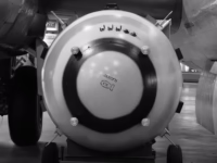 At some point during the loading of Fat Man into Bockscar, the nose of the bomb was stenciled with the letters "JANCFU" and the "FM" (with an outline of a bomb). The "FM," unsurprisingly, stands for Fat Man. The longer stencil is an acronym for "Joint Army Navy Civilian Fuck Up," a play of words on the more common SNAFU. Later, armed forces personnel would sign the bomb in various locations, though those signatures are not reproduced on any of the display units I visited. Located at the National Museum of the US Air Force in Dayton.
