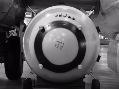 At some point during the loading of Fat Man into Bockscar, the nose of the bomb was stenciled with the letters "JANCFU" and the "FM" (with an outline of a bomb). The "FM," unsurprisingly, stands for Fat Man. The longer stencil is an acronym for "Joint Army Navy Civilian Fuck Up," a play of words on the more common SNAFU. Later, armed forces personnel would sign the bomb in various locations, though those signatures are not reproduced on any of the display units I visited. Located at the National Museum of the US Air Force in Dayton.