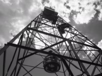 This recreation of the Gadget, as the scientists named the device, is shown here in this full-scale recreation being lifted to the top of the 100-foot tall tower. Located at the Nuclear Museum in Albuquerque.