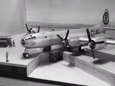 In this model from Wendover Historic Airfield (where Tibbets and crews trained to drop the Little Boy and Fat Man bombs) you can see the bomb loaded via special loading pit. The B-29 would drive up over the bomb which would be lifted up into the plane. Even for these B-29s the weight of the bomb was so great that the plane would jerk sharply upwards upon release of the weapon.