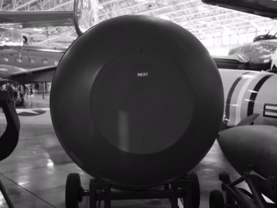 I do not know why the Hill Aerospace's unit lacks the rounded nose cover seen at the Museum of the US Air Force, nor why, lacking that cover, it also lacks the bolt holes that would have secured the cover to the main body.