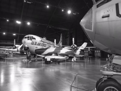 This image, from the National Museum of the US Air Force, in Dayton, gives you a sense of the size of the bomb in relation to the aircraft. The bomb is certainly big but does appear to be about the same size as a large external fuel tank. In use the pilot would, in an attempt to escape from the blast, "drop" the bomb with an upward flying maneuver called "toss bombing" where the plane would approach the target at a low altitude and then would suddenly climb and launch the bomb, sending it higher after its release and then letting it arc down, gaining precious seconds to put distance between the aircraft and the explosion. A second possible maneuver, which probably sounded as crazy to the pilots at the time as it does today, was to launch the bomb even higher on that same upward flying maneuver so that the bomb actually traveled backwards from the previous direction of the plane. Crazy stuff, indeed.