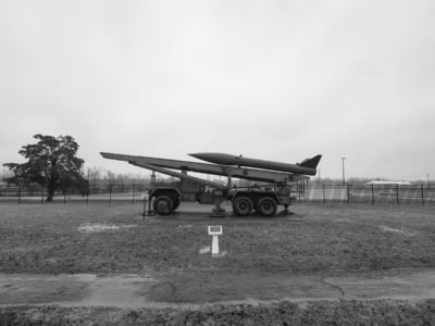 An Honest John displays at Camp Atterbury, a National Guard installation in Indiana. The historic weapons area is located just past the main gates and open to the public. Note that the lower two fins on the rocket have ben removed (very common to see) presumably to avoid people banging their heads on the fin's edge.