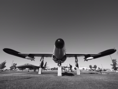 The pilot of this plane, which fire the only live test of a nuclear air-to-air missile, was Captain Eric W. Hutchison, along with Captain Alfred C. Barbee, who was the radar Intercept Officer. It is not known whether, in their evasive maneuvers, whether they looked back and saw the explosion or the resulting cloud. A chase plane was also present and additional planes flew into the nuclear cloud shortly after the explosion to make measurements. This photograph was made adjacent to the exit from Great Falls International Airport, in Montana.