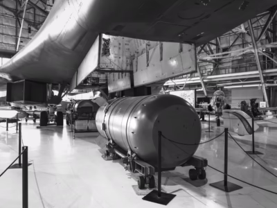 The Rockwell B-1A Lancer (one of four of the "A" model that were built in the 1970s) was a bomber built to carry nuclear weapons. However, the Mark 36--poised to be loaded into it as you can see here--was retired ten years before this plane was built. At the Wings over the Rockies Museum in Dallas, Texas.